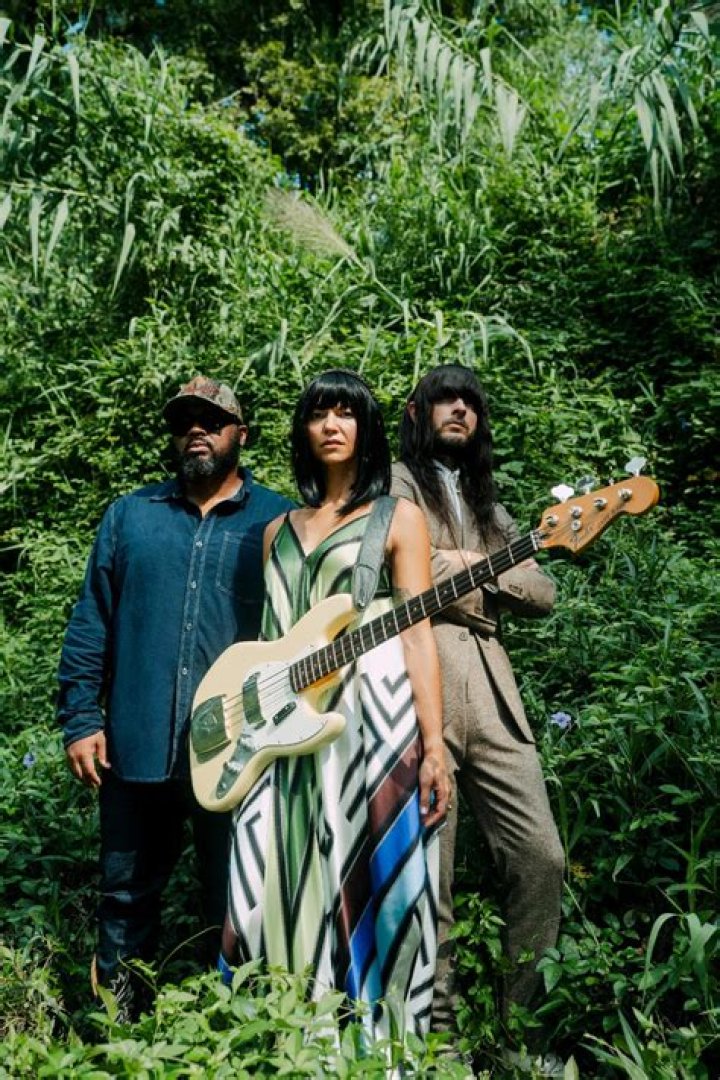 The Enigmatic Charm Of Khruangbin Without Wig